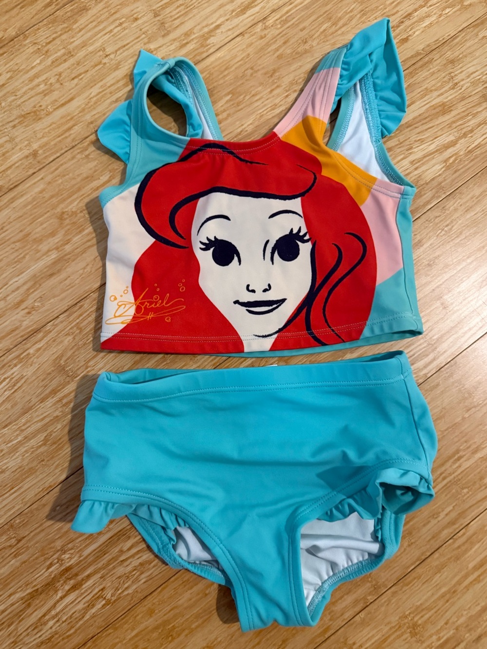 Disney Light Teal Trim White Swim Top with Ariel Accent